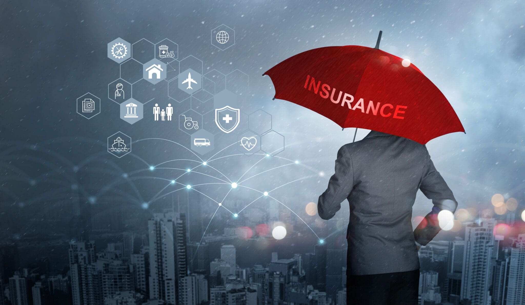 Businessman with red umbrella holding insurance.